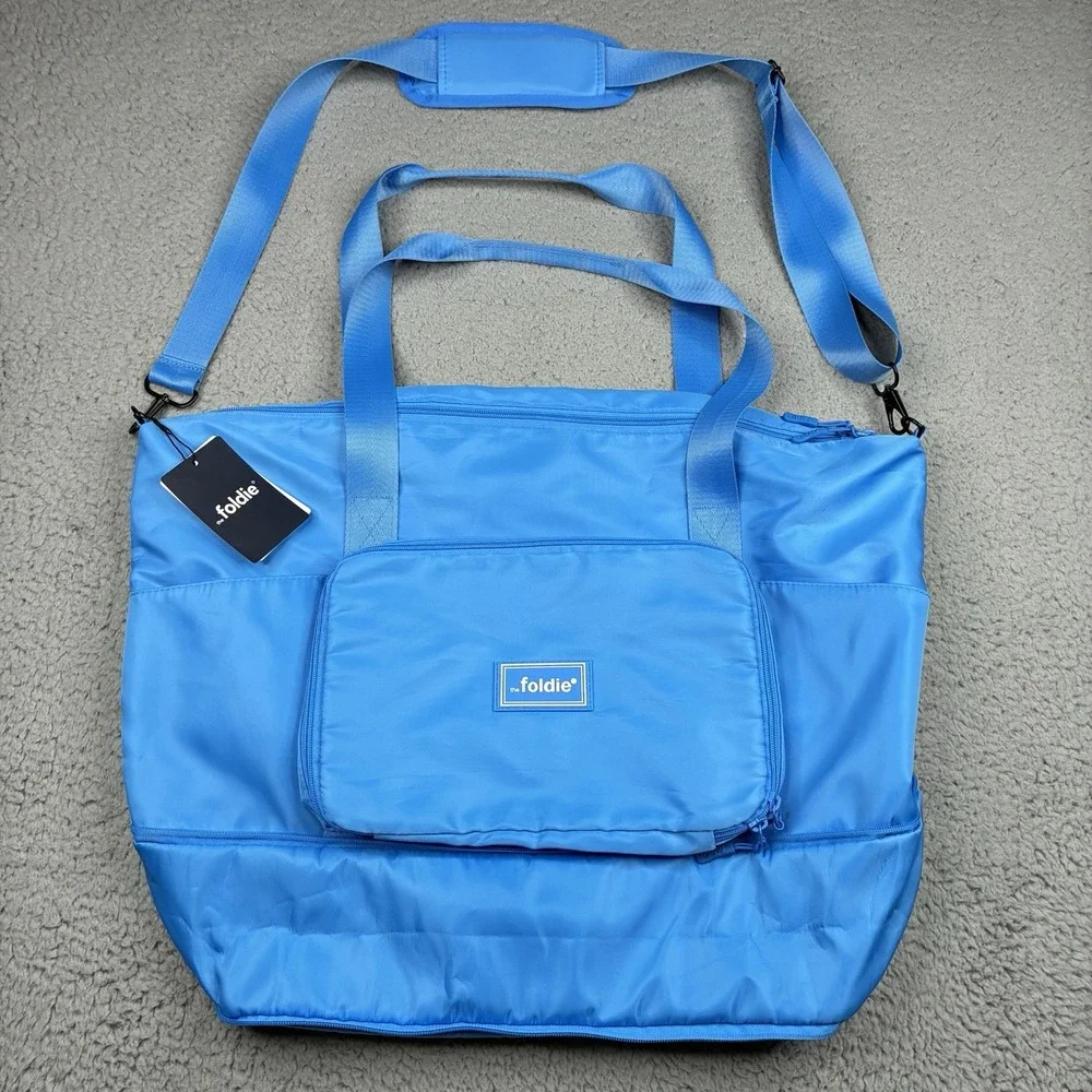The Foldie 40L Travel Bag Carry On Expandable Azure Blue Weekender Tote NWT